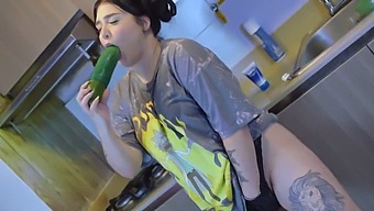 Busty Babe Gets Turned On And Uses A Cucumber For Pleasure