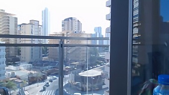 Sensual Gamer Girl Reveals Outfits On Balcony Stage